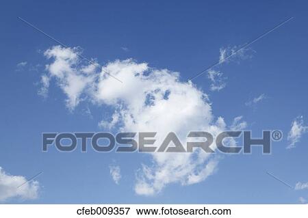 Blue sky with clouds View Large Photo Image Stock Photo - Blue sky with clouds. Fotosearch