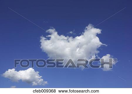 Stock Photo - Blue sky with clouds. Fotosearch