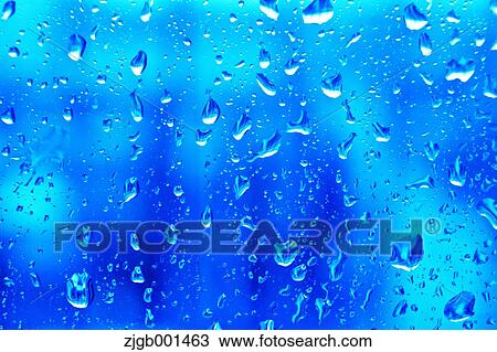Stock Image - Raindrops on glass. Fotosearch