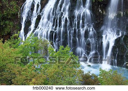 Stock Image - Shirahige waterfall, Hokkaido. Fotosearch