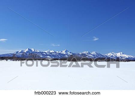 Snow field and mountains in Shibetsu, Hokkaido View Large Photo Image Stock Image - Snow field and mountains in Shibetsu, Hokkaido. Fotosearch