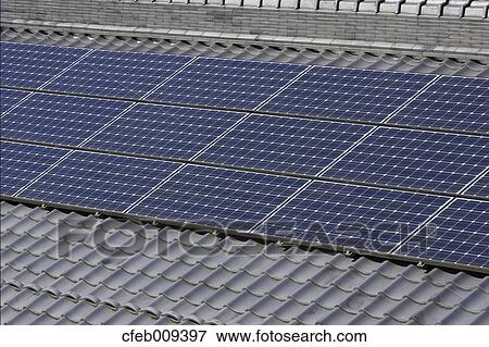 Solar panels on rooftop View Large Photo Image Stock Photo - Solar panels on rooftop. Fotosearch