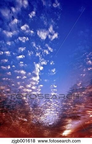 Sunset sky with clouds View Large Photo Image Stock Photo - Sunset sky with clouds. Fotosearch