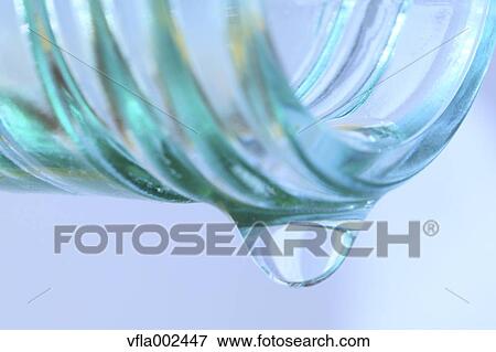 Water droplet on glass bottle View Large Photo Image Stock Photo - Water droplet on glass bottle. Fotosearch