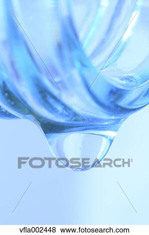Water droplet on glass bottle View Large Photo Image Stock Photo - Water droplet on glass bottle. Fotosearch