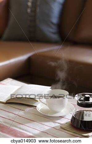 Coffee on a table View Large Photo Image Stock Image - Coffee on a table. Fotosearch