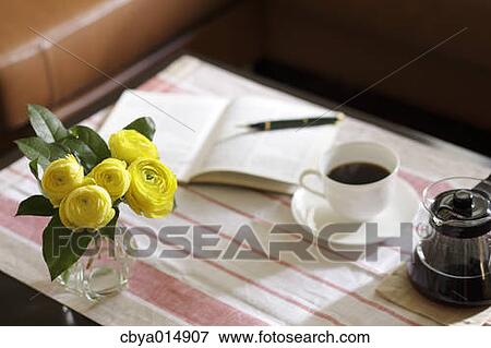 Coffee on a table View Large Photo Image Stock Photo - Coffee on a table. Fotosearch