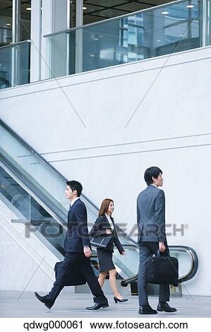 Stock Image - Japanese business people. Fotosearch
