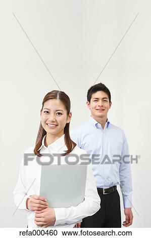 Stock Image - Japanese business people. Fotosearch