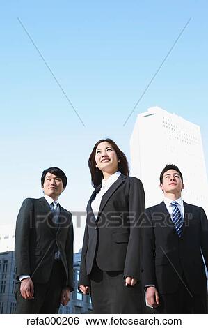 Stock Photograph - Japanese business people. Fotosearch