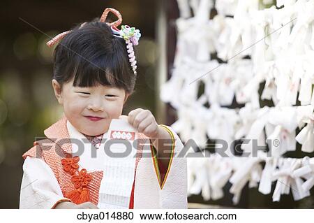 Japanese girl at Seven-Five-Three ceremony View Large Photo Image Stock Image - Japanese girl at Seven-Five-Three ceremony. Fotosearch