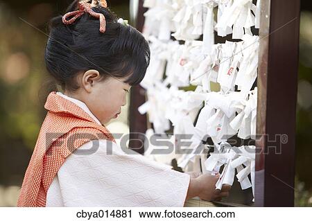 Stock Image - Japanese girl at Seven-Five-Three ceremony. Fotosearch