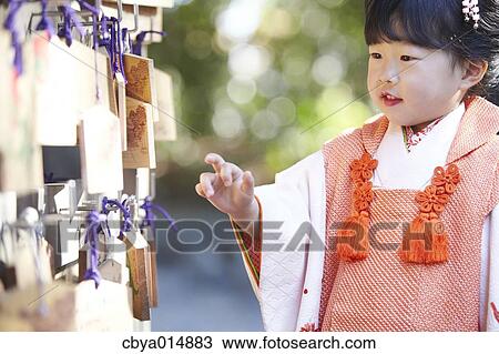 Japanese girl at Seven-Five-Three ceremony View Large Photo Image Stock Image - Japanese girl at Seven-Five-Three ceremony. Fotosearch