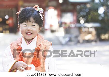 Stock Image - Japanese girl at Seven-Five-Three ceremony. Fotosearch