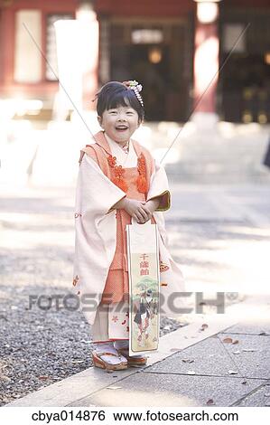 Japanese girl at Seven-Five-Three ceremony View Large Photo Image Stock Photograph - Japanese girl at Seven-Five-Three ceremony. Fotosearch