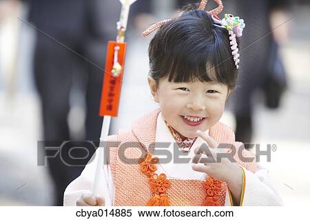Japanese girl at Seven-Five-Three ceremony View Large Photo Image Stock Photography - Japanese girl at Seven-Five-Three ceremony. Fotosearch