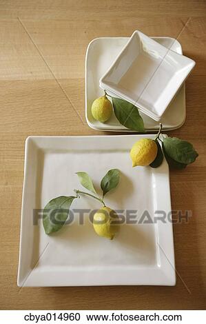Lemons on a table View Large Photo Image Stock Image - Lemons on a table. Fotosearch