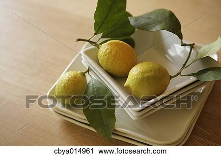 Lemons on a table View Large Photo Image Stock Image - Lemons on a table. Fotosearch