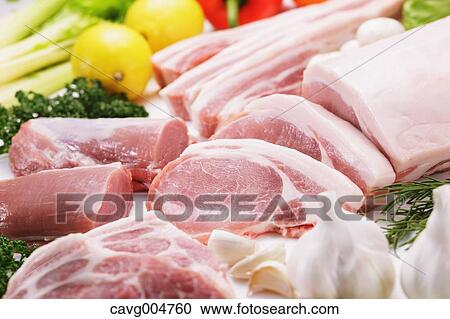 Raw pork meat and vegetables View Large Photo Image Stock Image - Raw pork meat and vegetables. Fotosearch