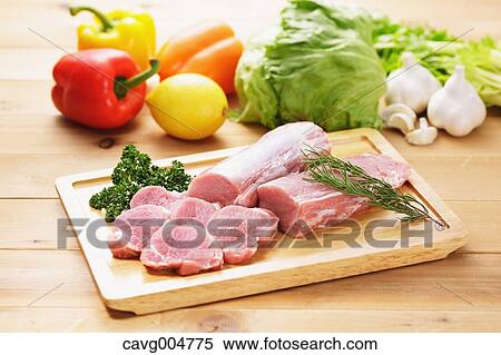 Raw pork meat and vegetables View Large Photo Image Stock Photography - Raw pork meat and vegetables. Fotosearch