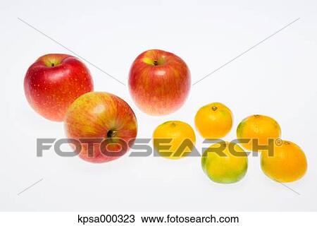 Stock Image - Apples and tangerines. Fotosearch