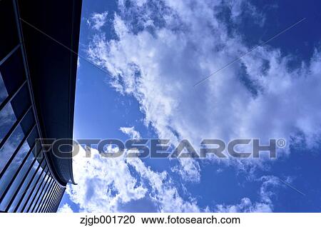 Stock Image - Blue sky and building. Fotosearch