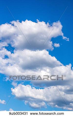 Blue sky with clouds View Large Photo Image Stock Image - Blue sky with clouds. Fotosearch