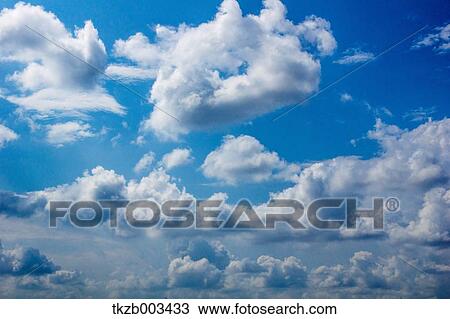 Blue sky with clouds View Large Photo Image Stock Image - Blue sky with clouds. Fotosearch