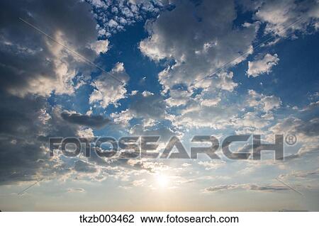 Blue sky with clouds View Large Photo Image Stock Image - Blue sky with clouds. Fotosearch
