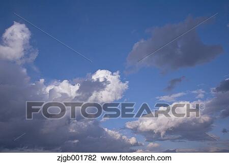Stock Image - Blue sky with clouds. Fotosearch