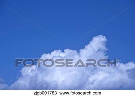 Blue sky with clouds View Large Photo Image Stock Image - Blue sky with clouds. Fotosearch