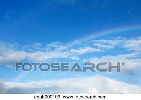 Blue sky with clouds View Large Photo Image Stock Photo - Blue sky with clouds. Fotosearch
