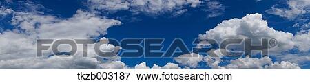 Blue sky with clouds View Large Photo Image Stock Photo - Blue sky with clouds. Fotosearch
