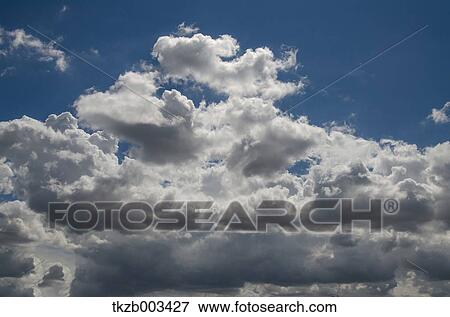 Stock Photo - Blue sky with clouds. Fotosearch