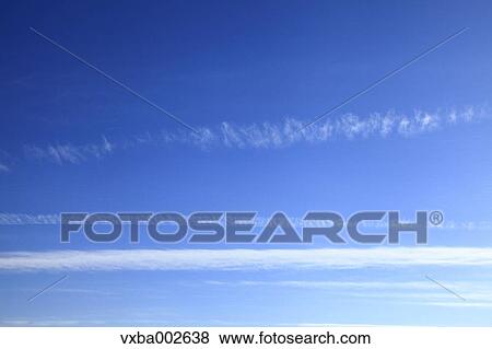 Blue sky with clouds View Large Photo Image Stock Photo - Blue sky with clouds. Fotosearch