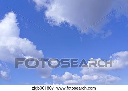 Blue sky with clouds View Large Photo Image Stock Photo - Blue sky with clouds. Fotosearch