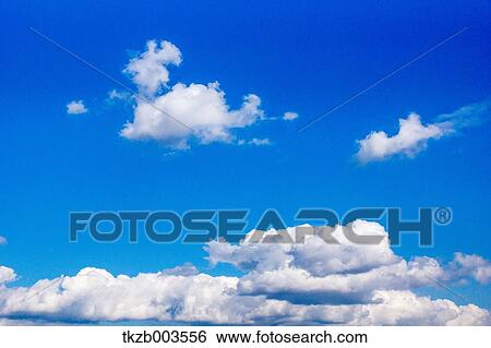 Blue sky with clouds View Large Photo Image Stock Photograph - Blue sky with clouds. Fotosearch