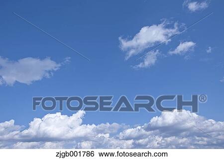 Stock Photograph - Blue sky with clouds. Fotosearch