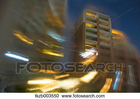 Stock Image - Blurred buildings. Fotosearch