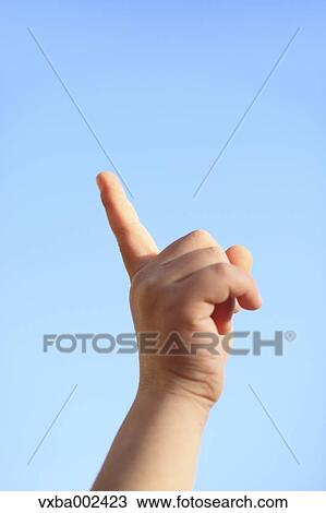 Child pointing a finger to the sky View Large Photo Image Stock Image - Child pointing a finger to the sky. Fotosearch