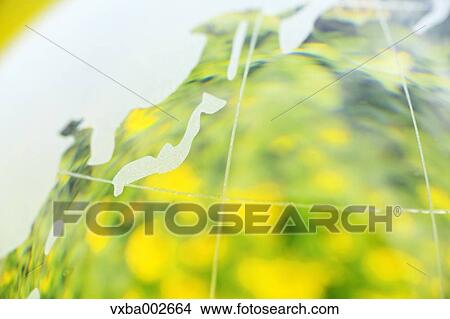 Crystal globe in rapeseed field View Large Photo Image Picture - Crystal globe in rapeseed field. Fotosearch
