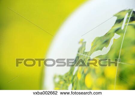 Crystal globe in rapeseed field View Large Photo Image Stock Image - Crystal globe in rapeseed field. Fotosearch