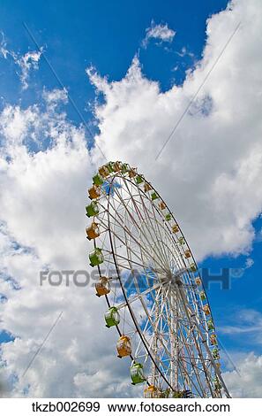 Ferris wheel and blue sky View Large Photo Image Stock Photo - Ferris wheel and blue sky. Fotosearch