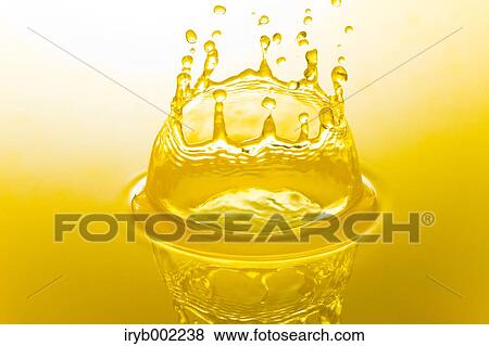 Golden water crown View Large Photo Image Stock Photo - Golden water crown. Fotosearch