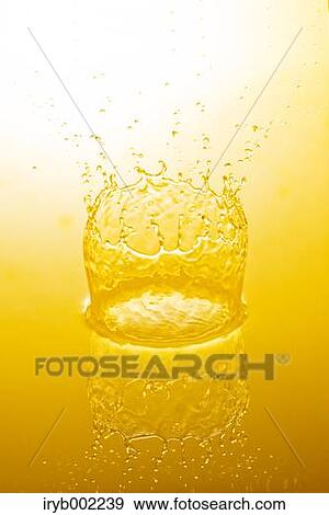 Stock Photo - Golden water crown. Fotosearch