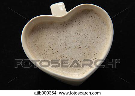 Picture - Heart shaped cappuccino. Fotosearch