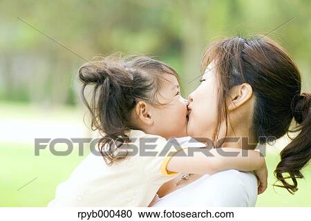 Stock Image - Japanese mother and daughter. Fotosearch