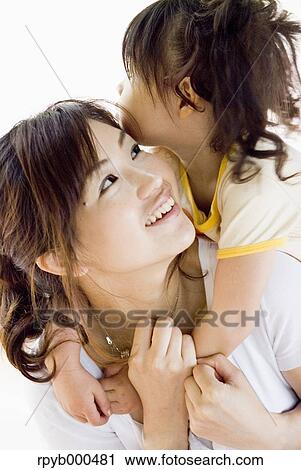 Japanese mother and daughter View Large Photo Image Stock Image - Japanese mother and daughter. Fotosearch