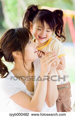 Japanese mother and daughter View Large Photo Image Stock Image - Japanese mother and daughter. Fotosearch