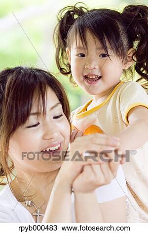 Japanese mother and daughter View Large Photo Image Stock Image - Japanese mother and daughter. Fotosearch